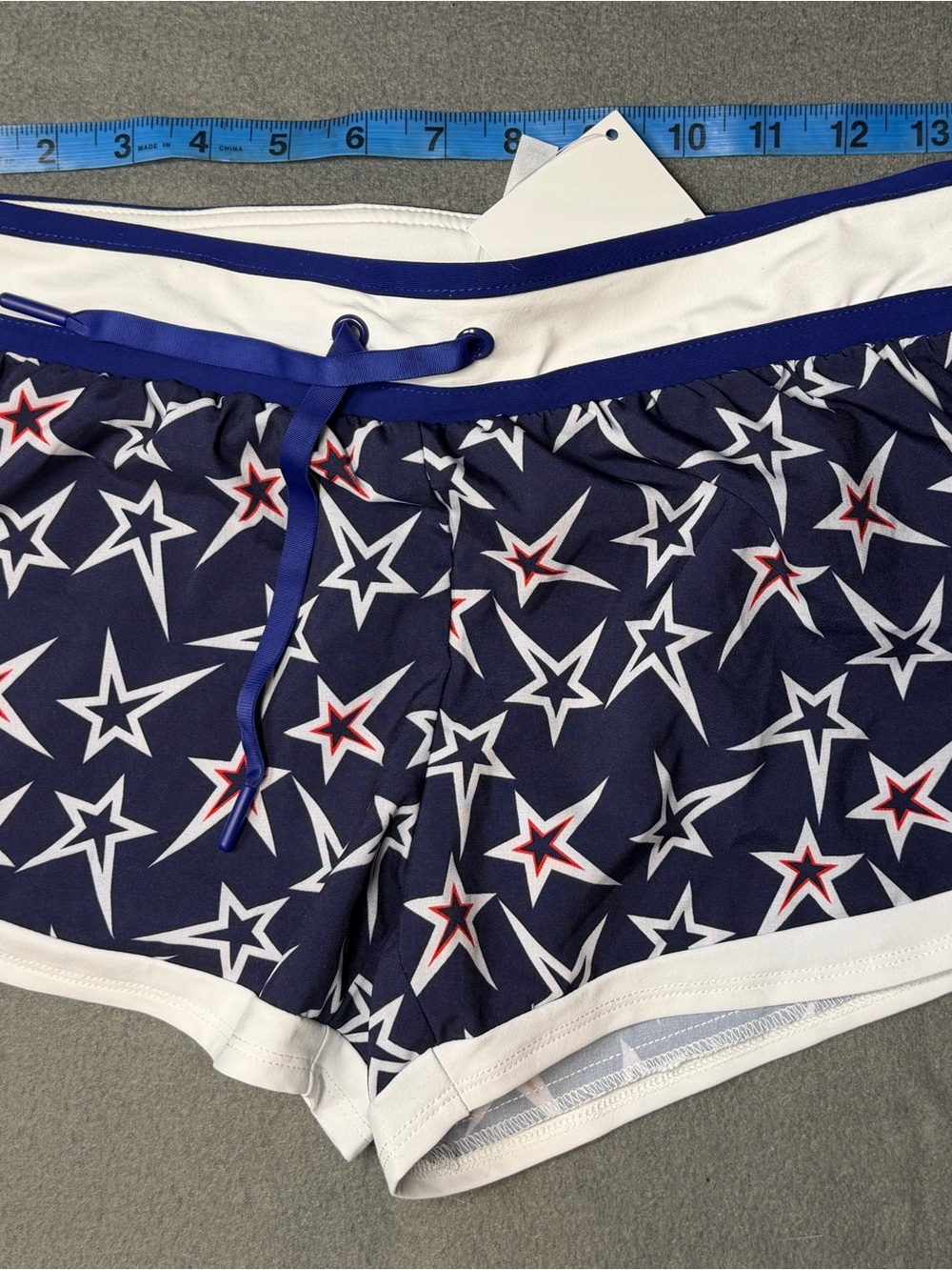 Fabletics Navy Star Print Athletic Shorts with White Trim